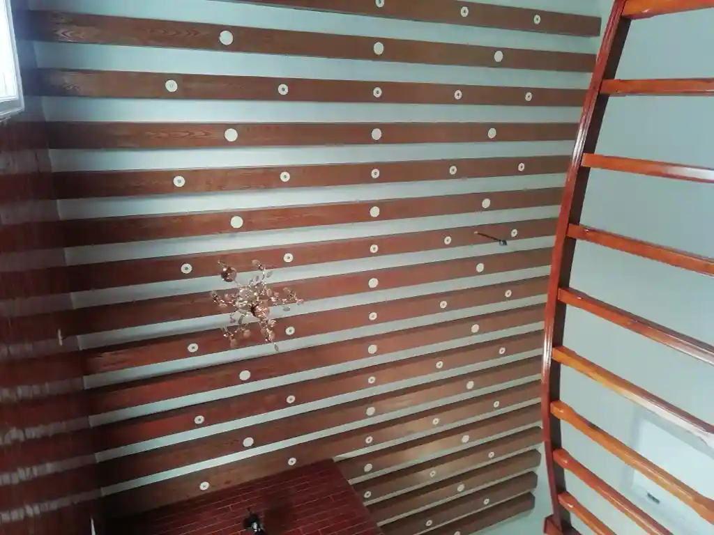 Modern wooden false ceiling with stylish panel design